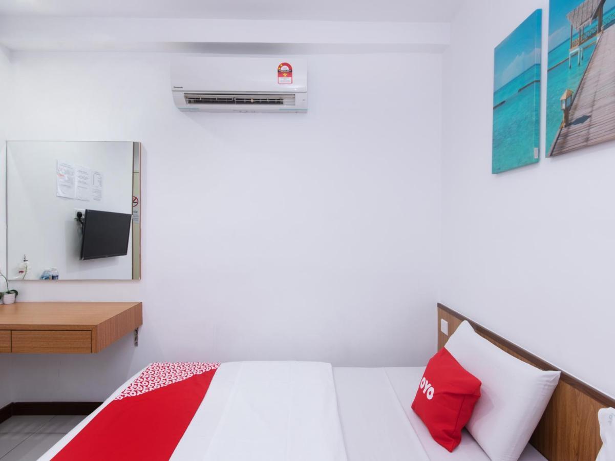 Oyo 89345 Api-Api Gh Hotel Kota Kinabalu Bagian luar foto