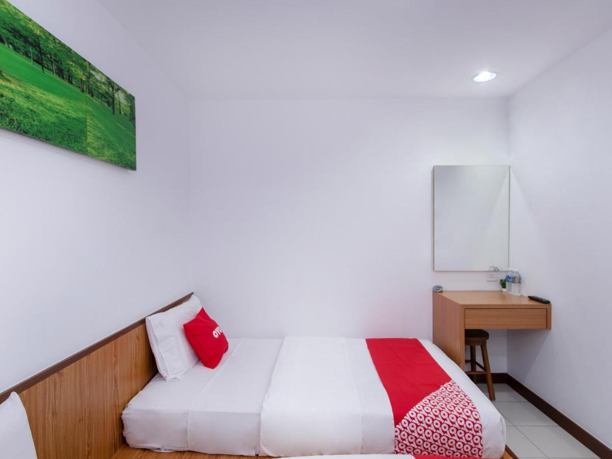 Oyo 89345 Api-Api Gh Hotel Kota Kinabalu Bagian luar foto